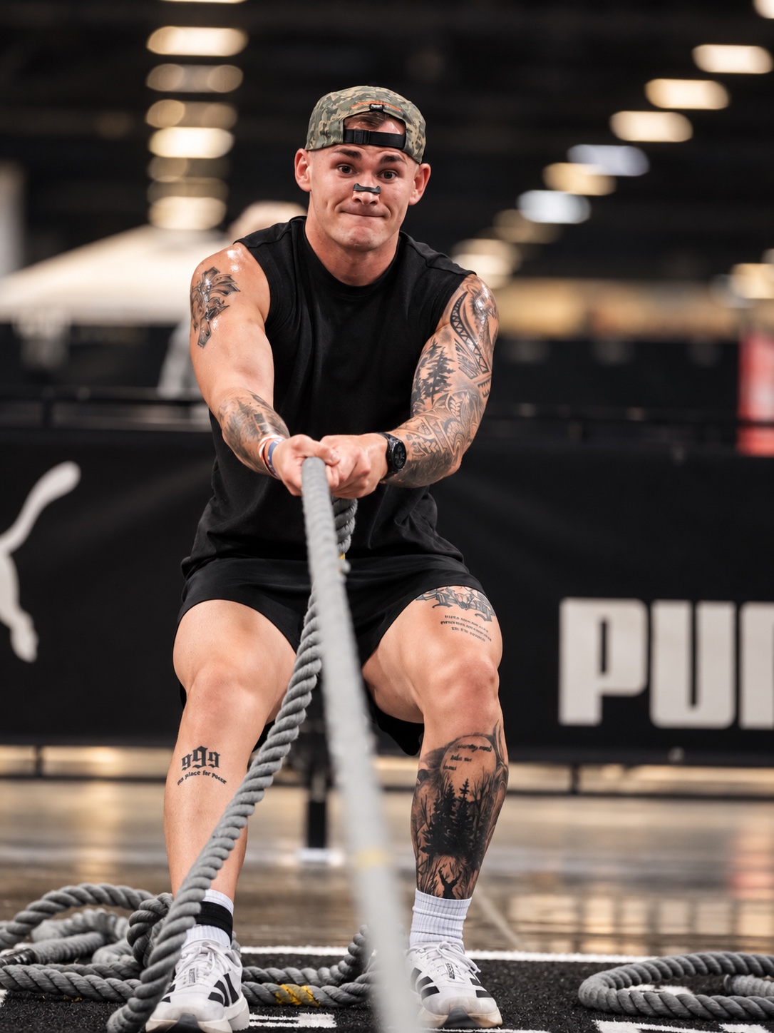 Jake pulling a sled rope during HYROX